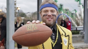 Football in a three-piece suit