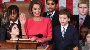 Pelosi takes oath of office with kids