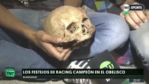 Football fan exhumes grandad’s skull to celebrate team’s historic win