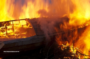 One of the surviving crew members on board the Conception signaled that the fire that killed 34 people may have started a phone charging station.