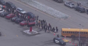 School officer shot armed student in classroom, police say