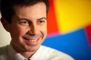 Transportation Secretary Pete Buttigieg–just back from months off after adopting–tasked with supply chain solution